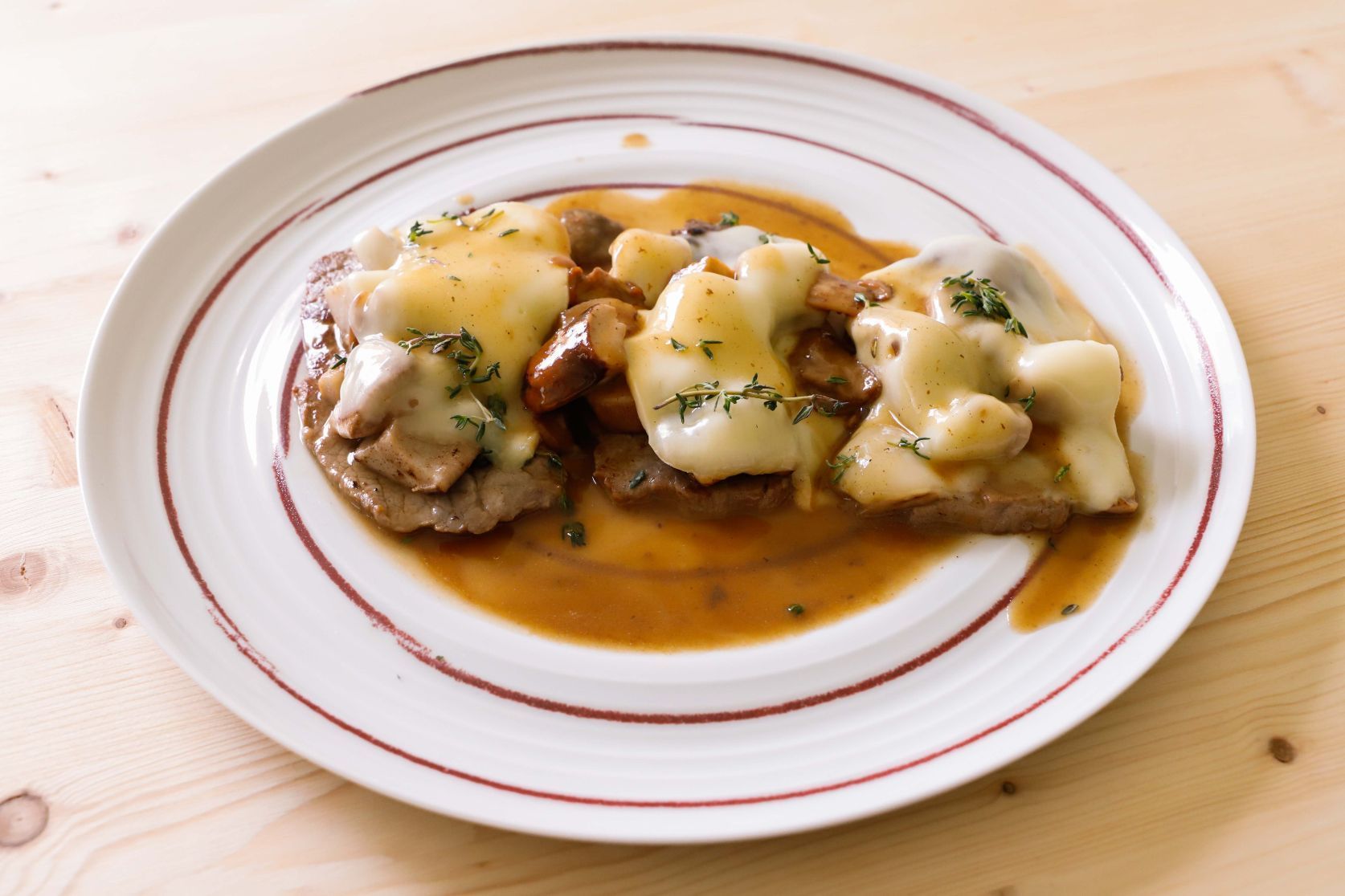 fettine-di-bovino-adulto-con-contorno-di-funghi-porcini-thumbnail